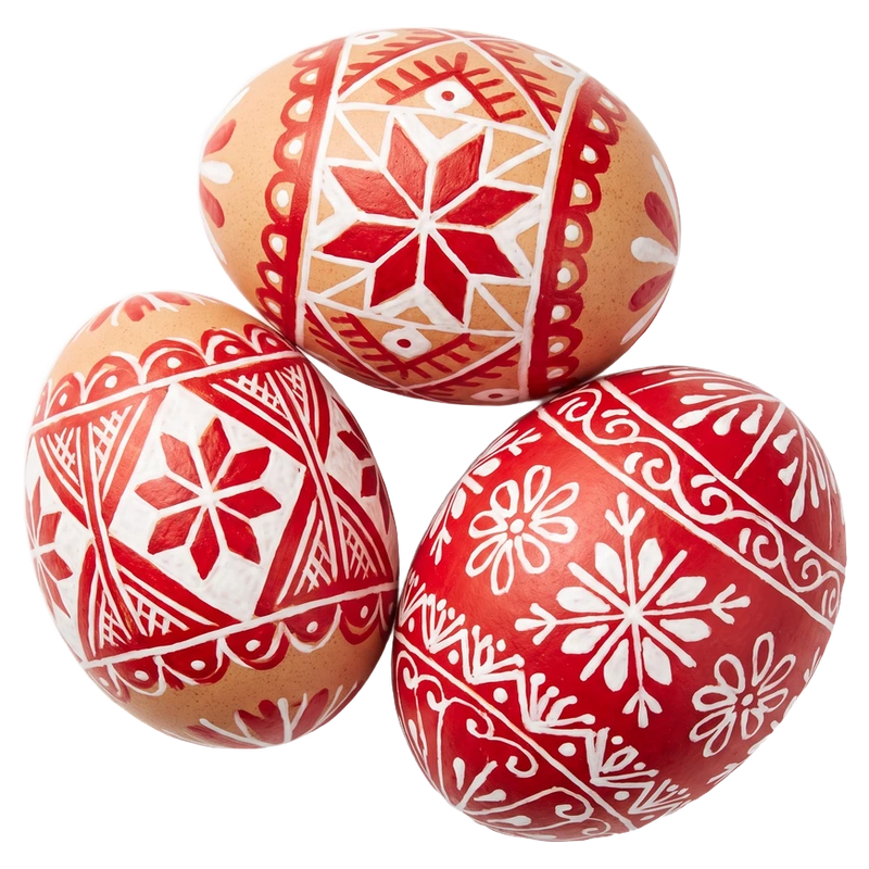 Trzy ręcznie malowane pisanki we wzory ludowe